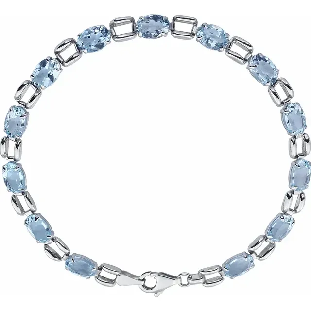 14K White 7x5 mm Oval Sky Blue Topaz 7" Bracelet