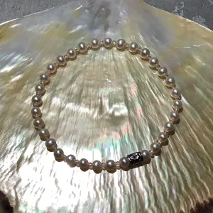 7.25" Stretch Bracelet with Gemmy 4-4.5mm Cultured Freshwater Pearls, Swarovski Crystal & Sterling Silver Floral Bead