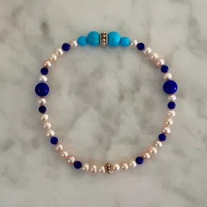 7" Stretch Bracelet with Natural Sleeping Beauty Turquoise and Lapis Lazuli Beads, Natural Pastel Color Cultured Freshwater Pearls, and Handmade Sterling Silver Bali-Style Beads