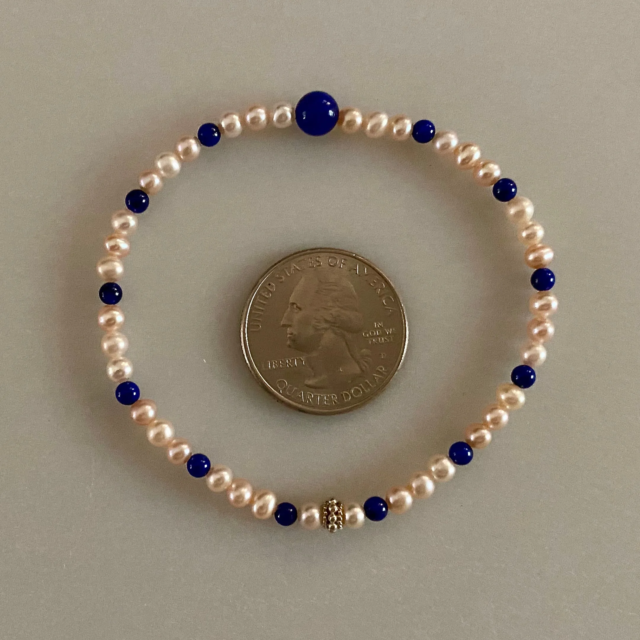 Arpaia 7.25" Stretch Bracelet with Natural Lapis Lazuli Beads, Natural Blush Pink Color Cultured Freshwater Pearls, and Handmade Sterling Silver Bali-Style Bead