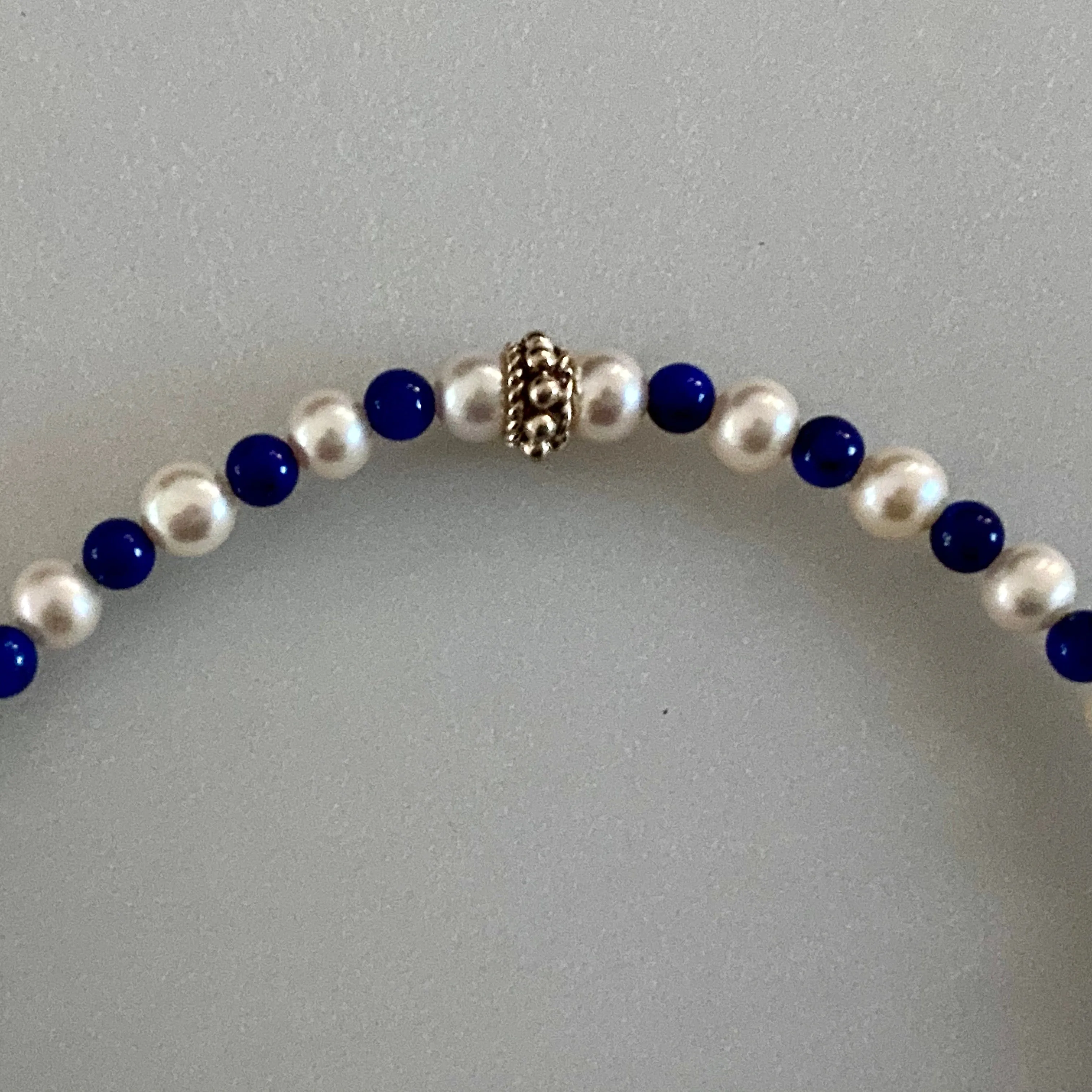 Arpaia 7.25" Stretch Bracelet with Natural Lapis Lazuli Beads, White Baby Cultured Freshwater Pearls & Handmade Sterling Silver Bali Bead