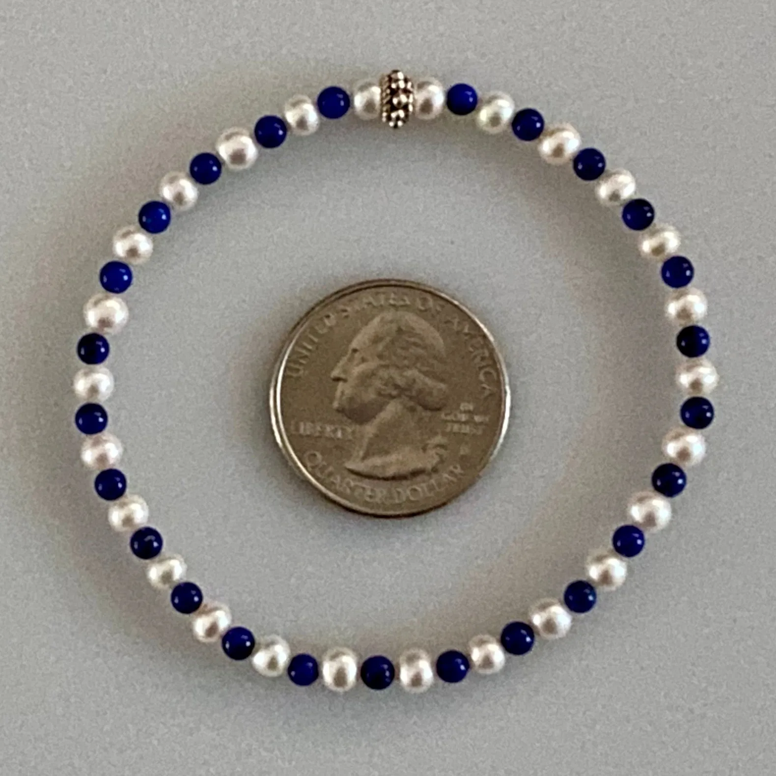 Arpaia 7.25" Stretch Bracelet with Natural Lapis Lazuli Beads, White Baby Cultured Freshwater Pearls & Handmade Sterling Silver Bali Bead
