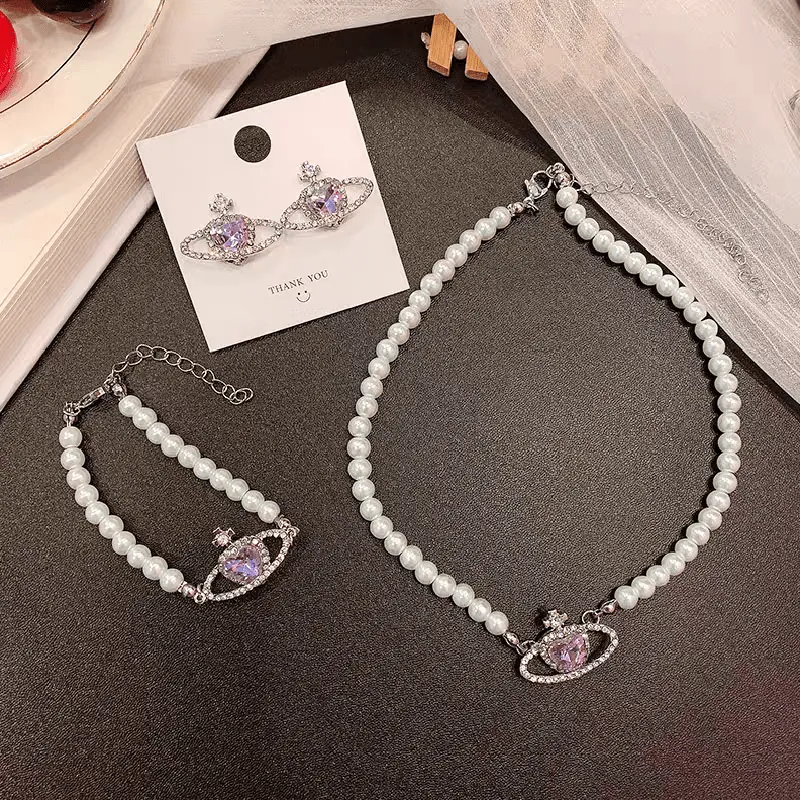 Chic CZ Inlaid Purple Saturn Necklace Earrings Bracelet Set