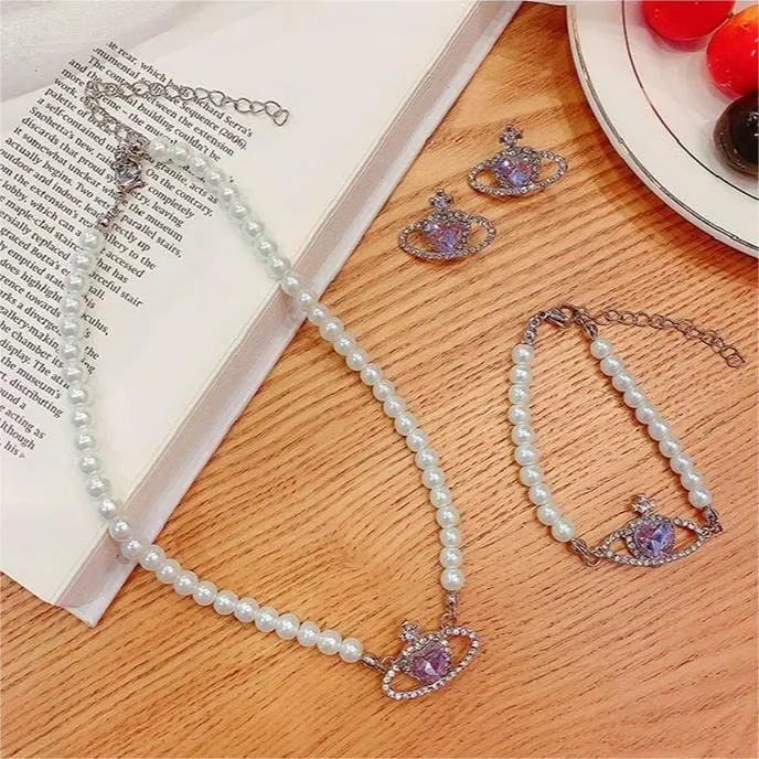 Chic CZ Inlaid Purple Saturn Necklace Earrings Bracelet Set