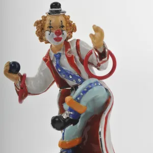 Circus Clown on Unicycle Joggling