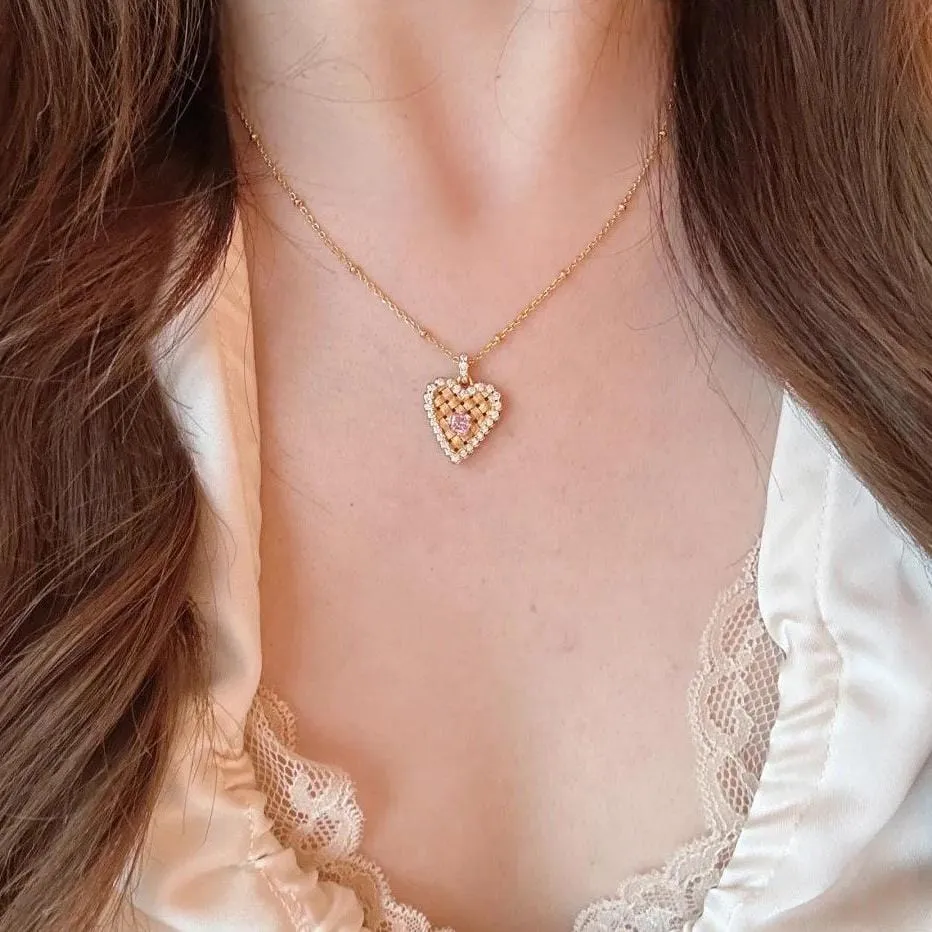 Elegant CZ Inlaid Braided Heart Necklace