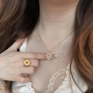 Elegant CZ Inlaid Braided Heart Necklace