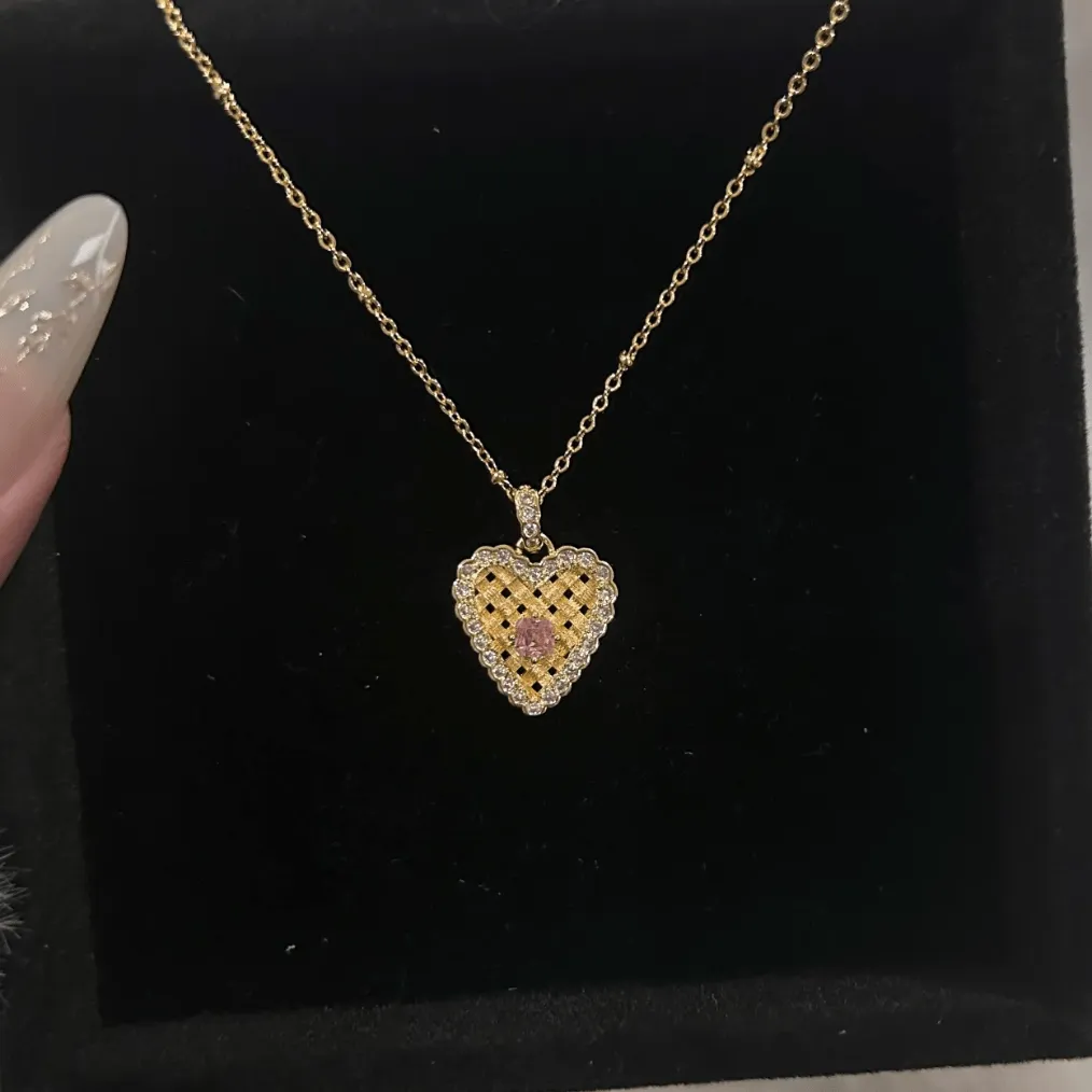 Elegant CZ Inlaid Braided Heart Necklace