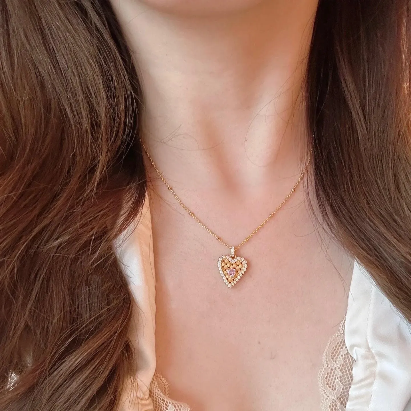 Elegant CZ Inlaid Braided Heart Necklace