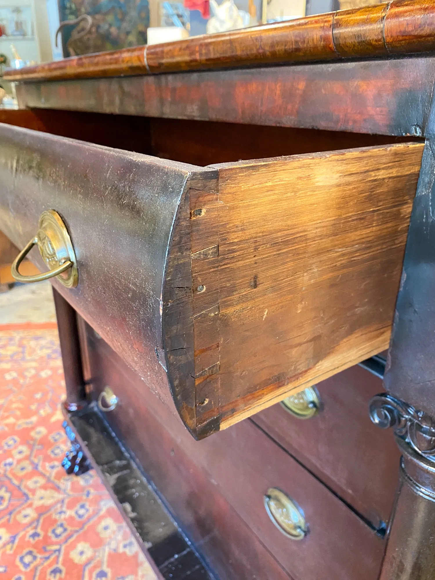 Large Empire Carved Chest of Drawers with Paw Feet and Brass Hardware