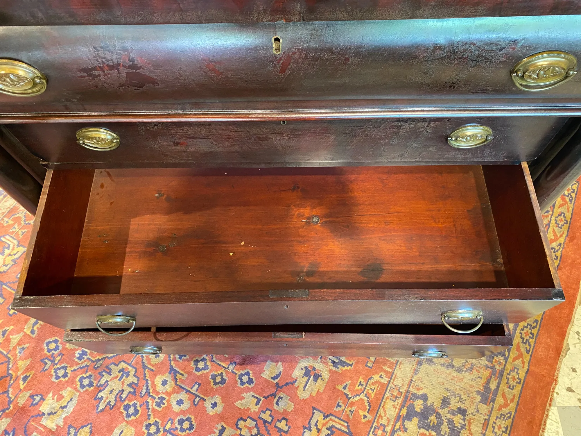 Large Empire Carved Chest of Drawers with Paw Feet and Brass Hardware