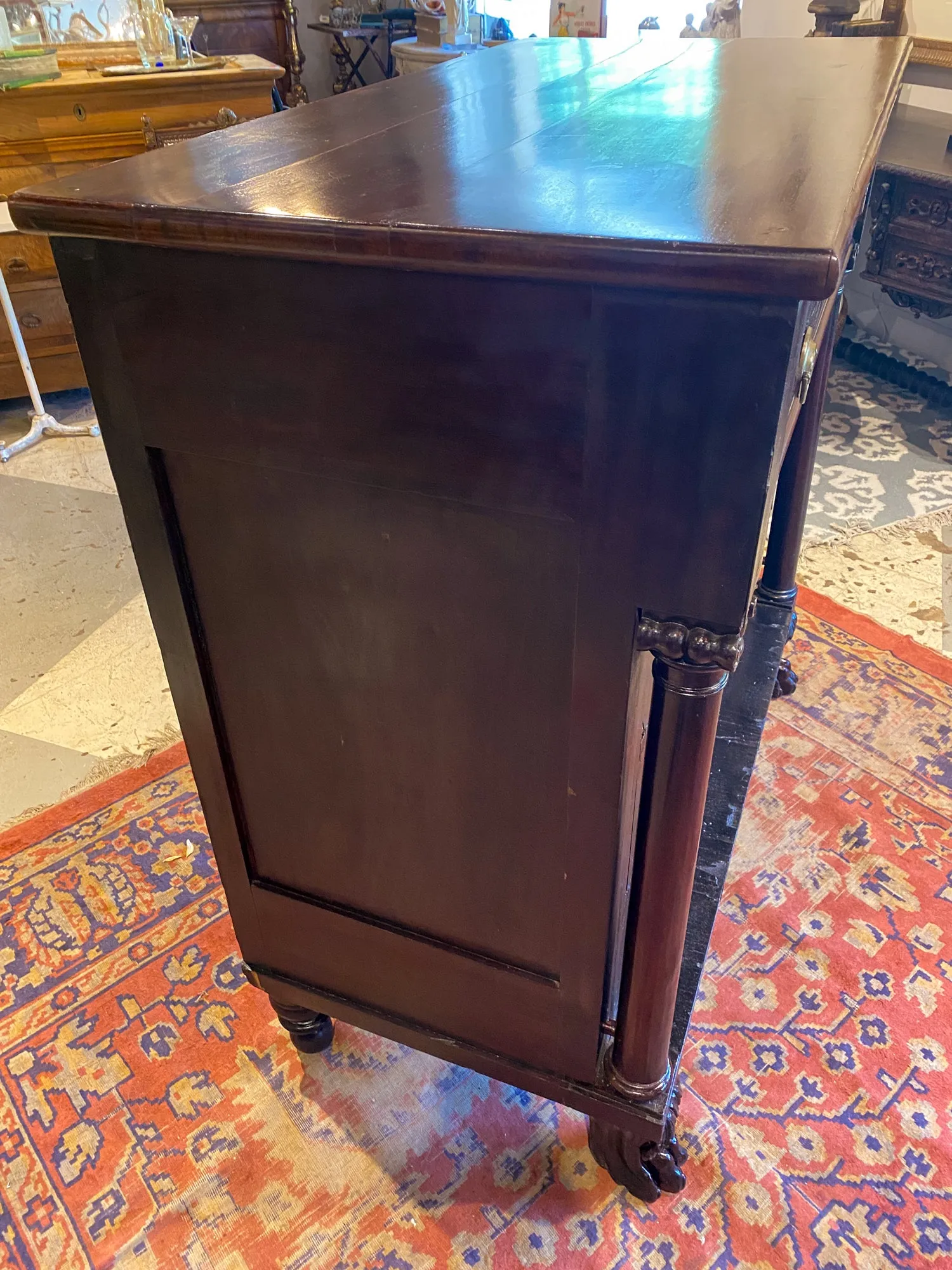 Large Empire Carved Chest of Drawers with Paw Feet and Brass Hardware
