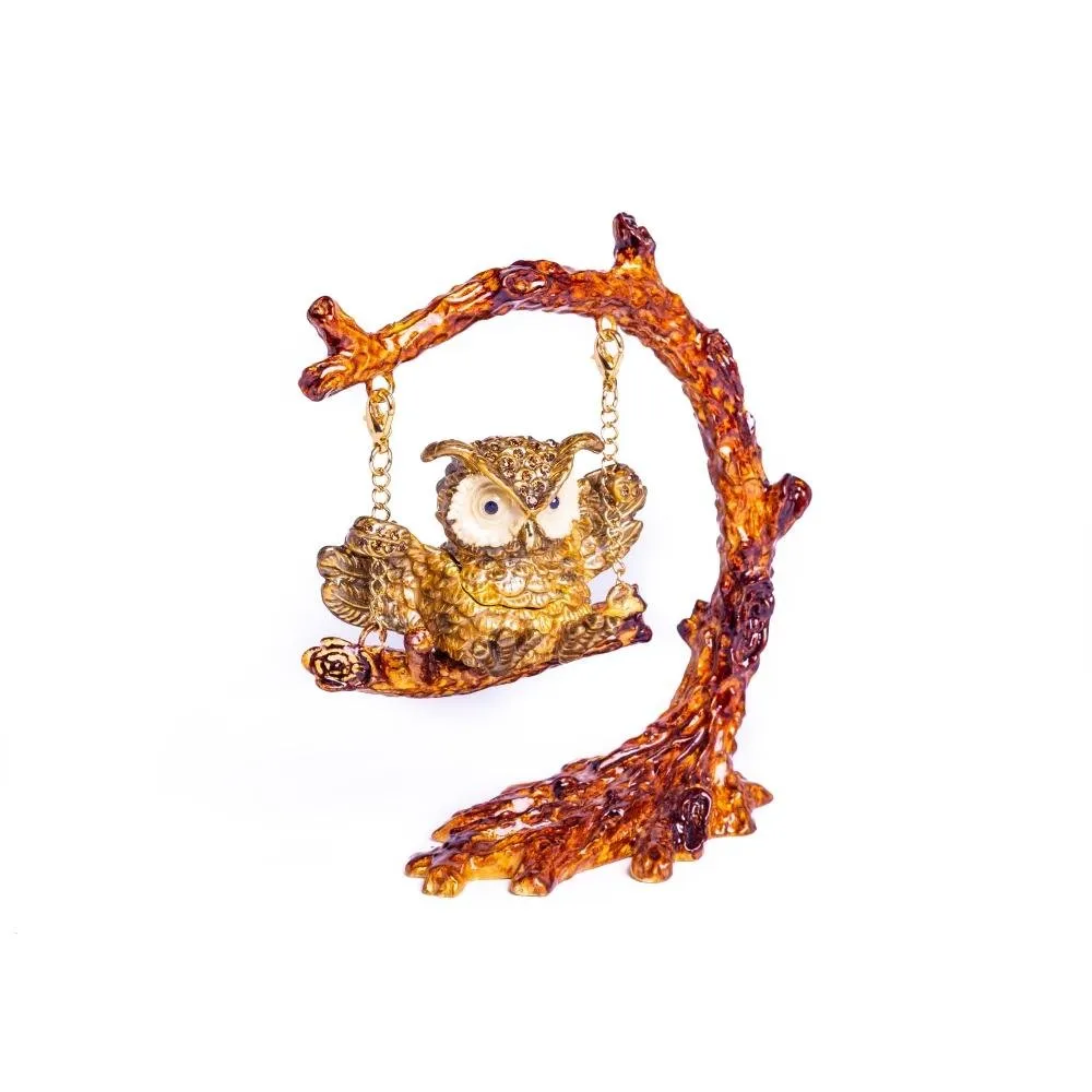 Owl Swinging on a Tree Branch