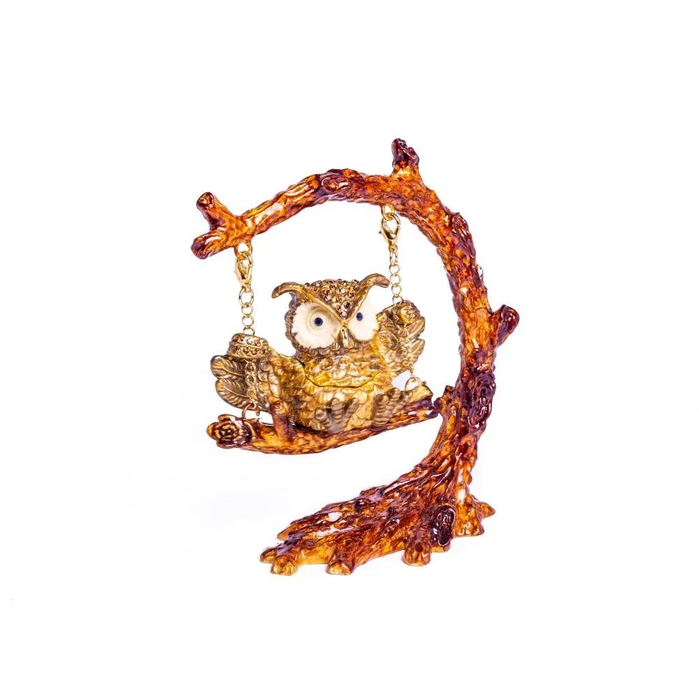 Owl Swinging on a Tree Branch