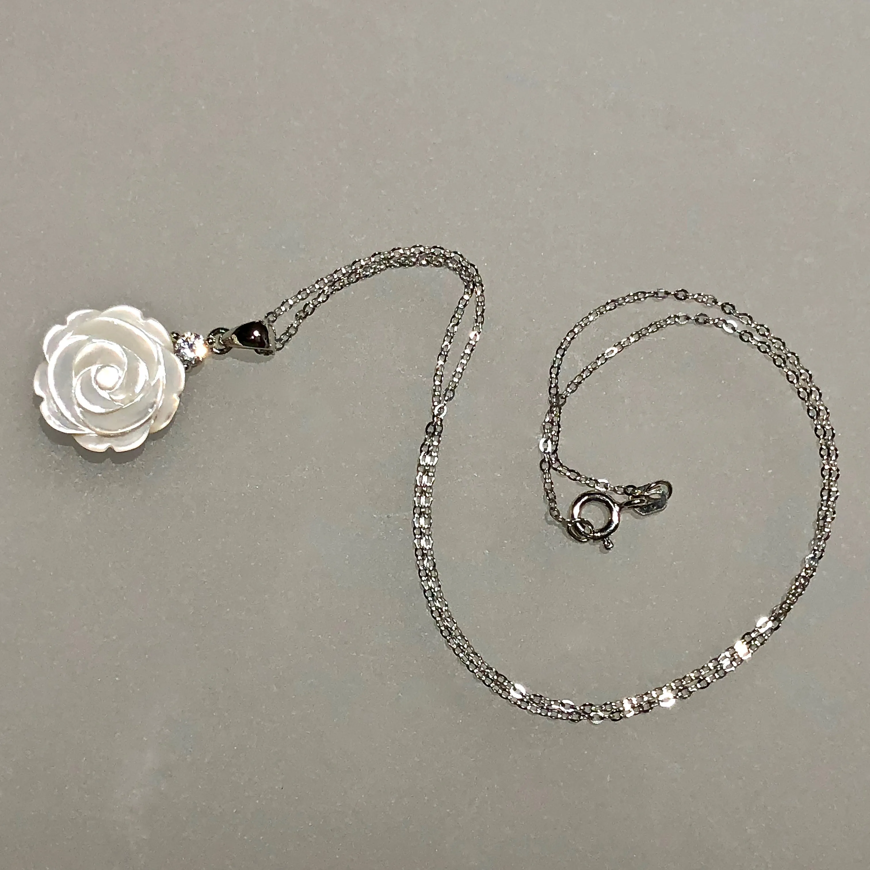 Rhodium-Plated 925 Sterling Silver Pendant ~ 15mm Rose-Carved Natural Shell with CZ Accent (chain sold separately)