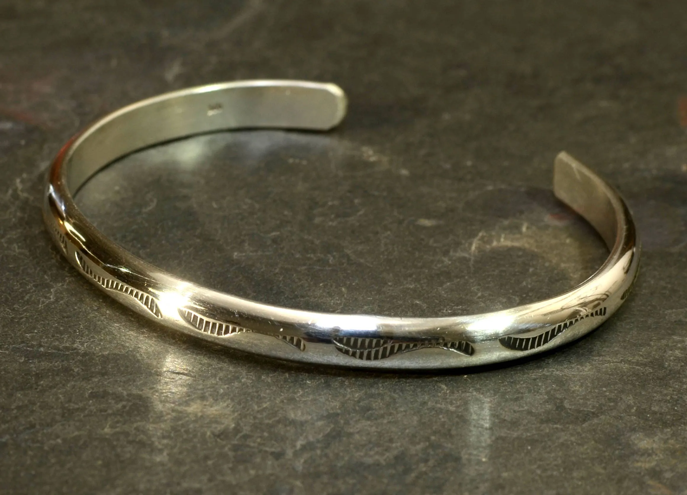 Sterling Silver Half Round Bracelet Imprinted with Native American Metal Stamps