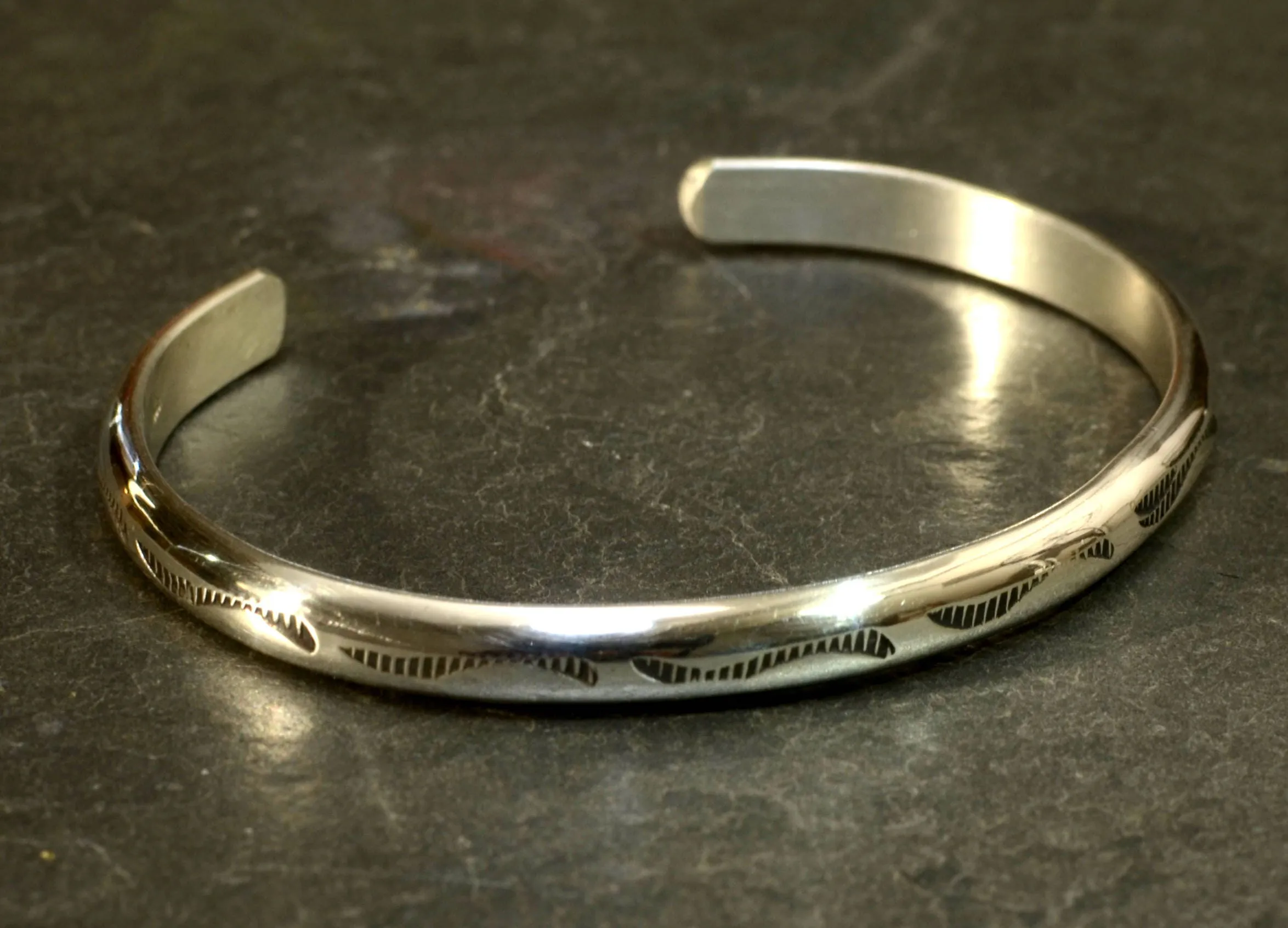Sterling Silver Half Round Bracelet Imprinted with Native American Metal Stamps