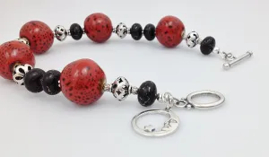 Sterling Silver, Red/ Black Raku Porcelain and Bronze Infused Black Turquoise Bracelet