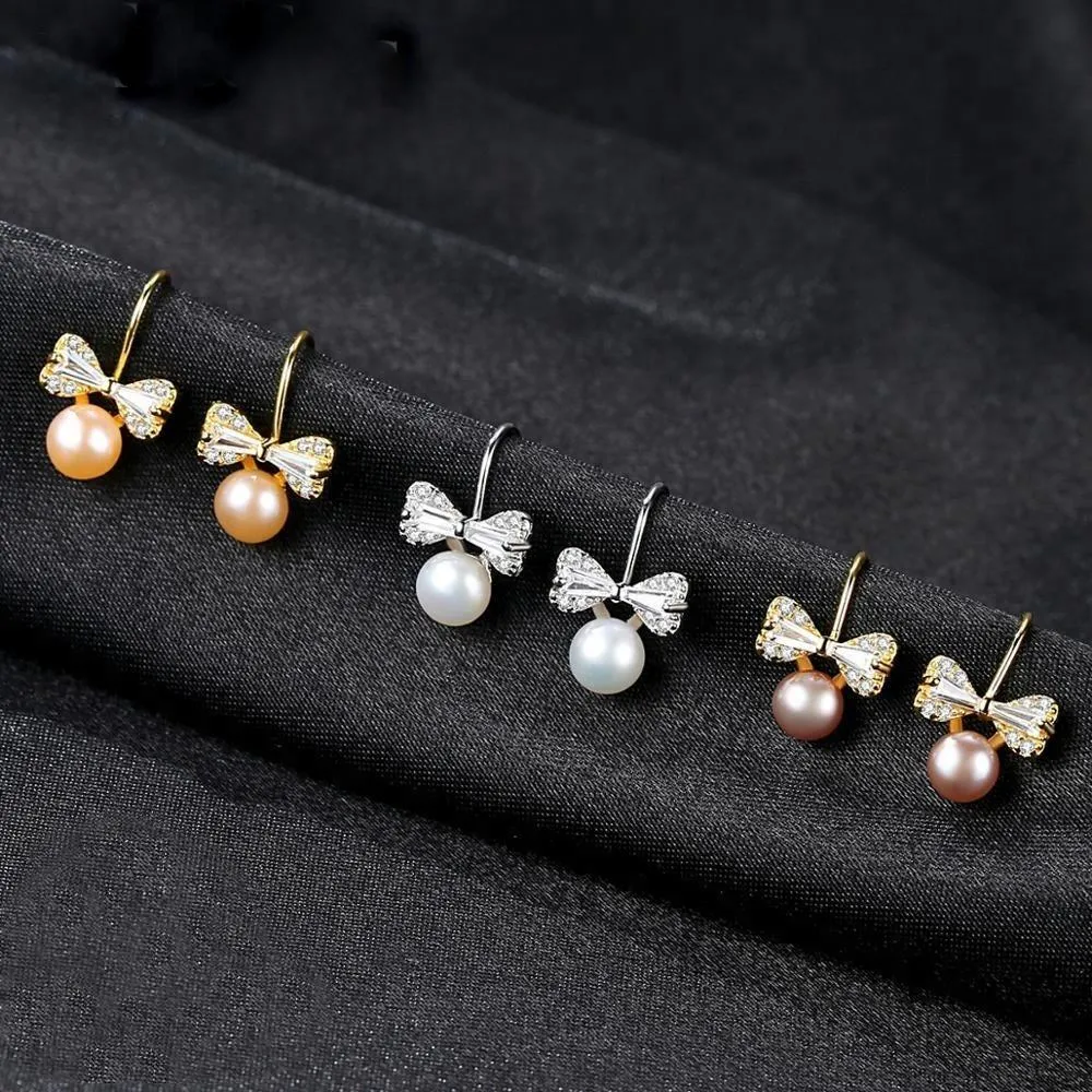 Sterling Silver Small Ribbon Natural Pearl Studs