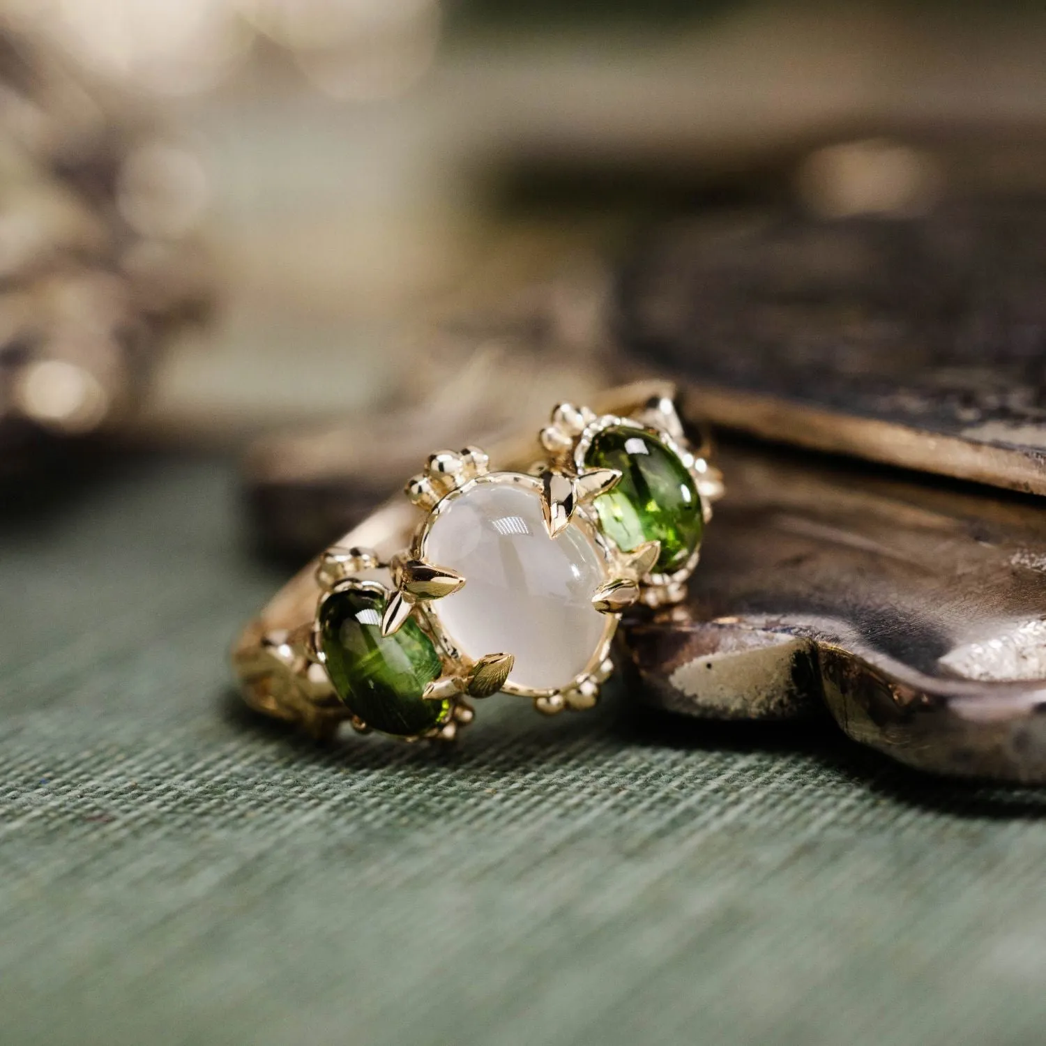 The Myzelle - Vintage-Inspired Oval Cabochon Three Stone Engagement Ring with Moonstone & Green Tourmaline
