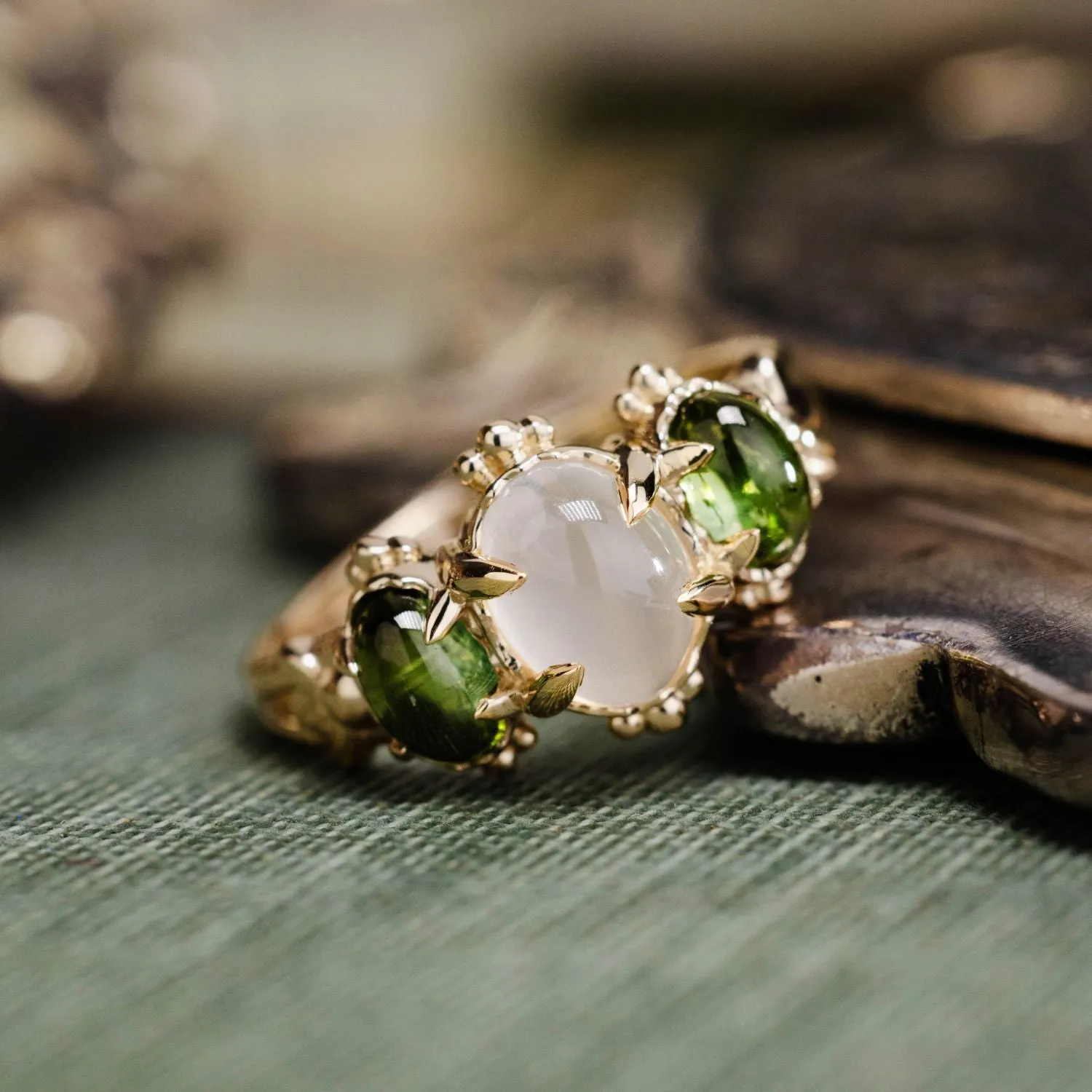 The Myzelle - Vintage-Inspired Oval Cabochon Three Stone Engagement Ring with Moonstone & Green Tourmaline